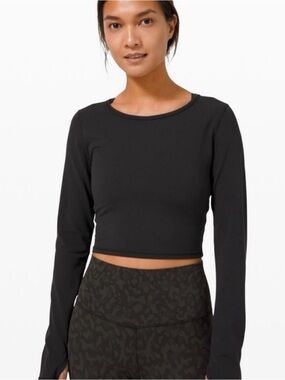 Lululemon Wunder Train Cropped Black Long Sleeve. Size: 6.